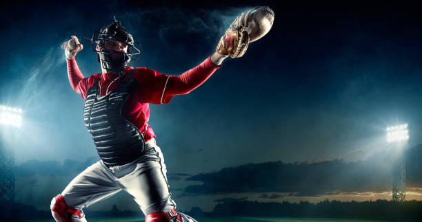 Baseball catcher on stadium Image of a baseball catcher ready to catch baseball. He is wearing unbranded generic baseball uniform. The game takes place on outdoor baseball stadium. The stadium is made in 3D. baseball pitcher baseball player baseball diamond stock pictures, royalty-free photos & images