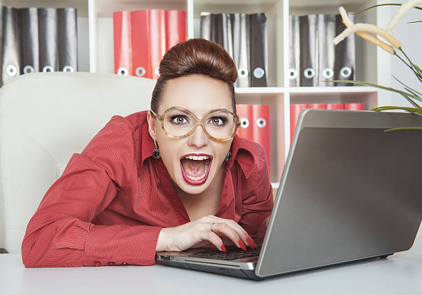 istock Crazy business woman working 525740681