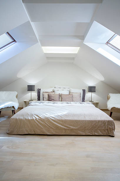 istock Enormous bed in the attic 525740807