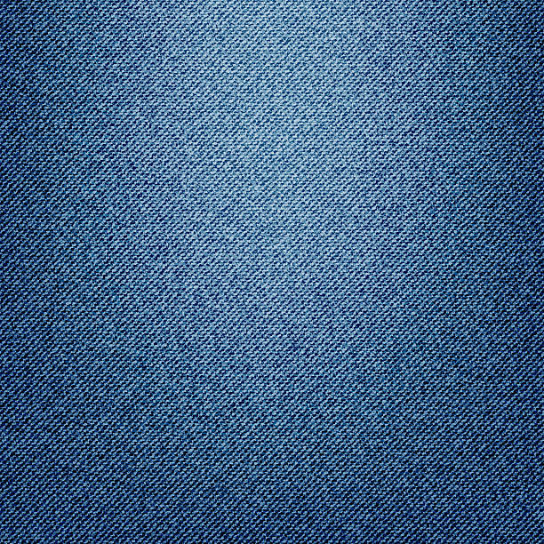 istock Texture of blue jeans textile close up 525751359