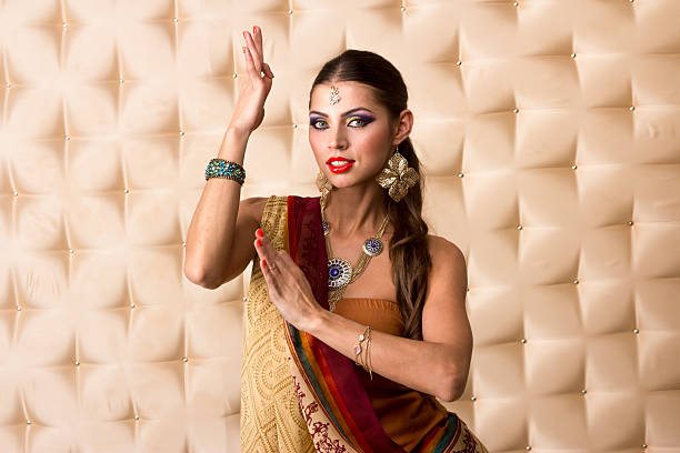 istock European woman posing in Indian Style 525751369