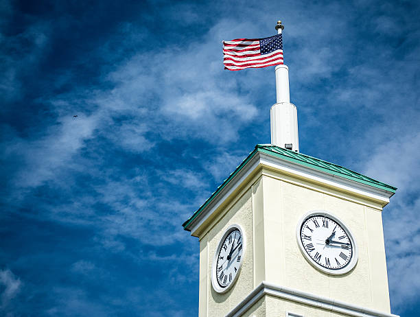 istock American Flag on top of Clock tower 525752767