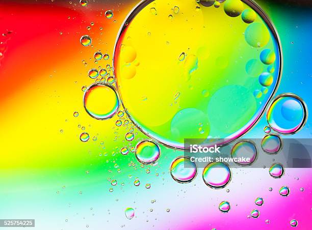 Background Of Colorful Oil Drops In Water Stock Photo - Download Image Now - Abstract, Backgrounds, Beauty
