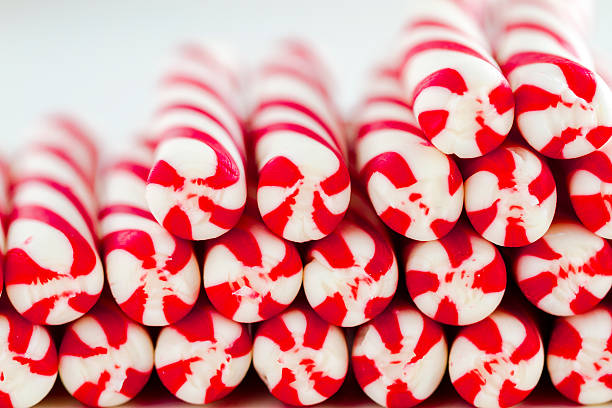 istock Christmas Candy Canes and Peppermint Sticks 525754429