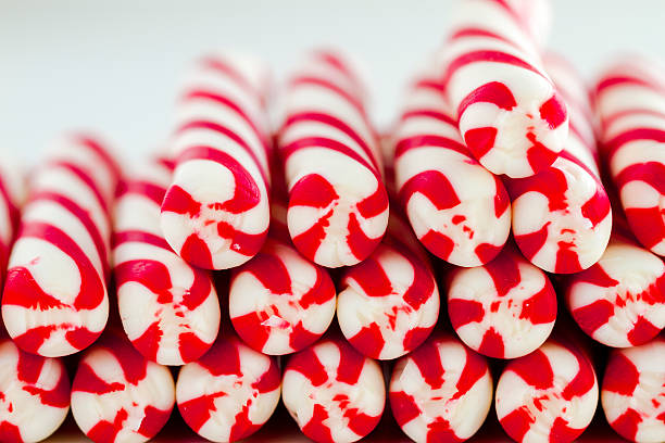 istock Christmas Candy Canes and Peppermint Sticks 525754455