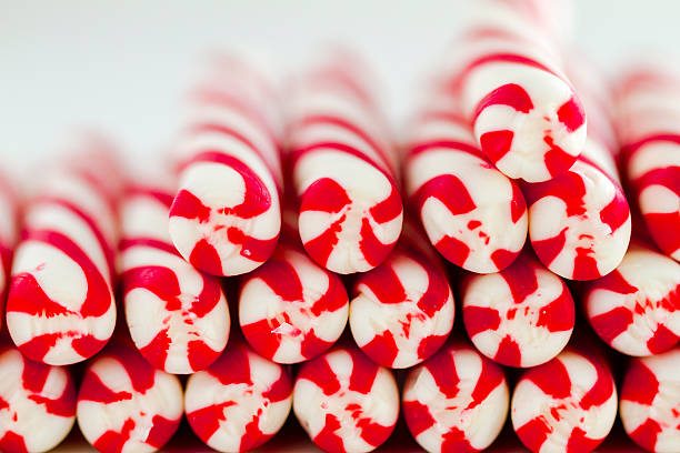 istock Christmas Candy Canes and Peppermint Sticks 525754707