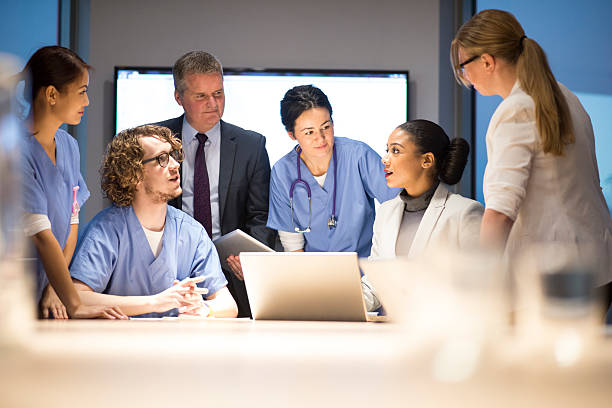 istock business and medicine working together 525755895