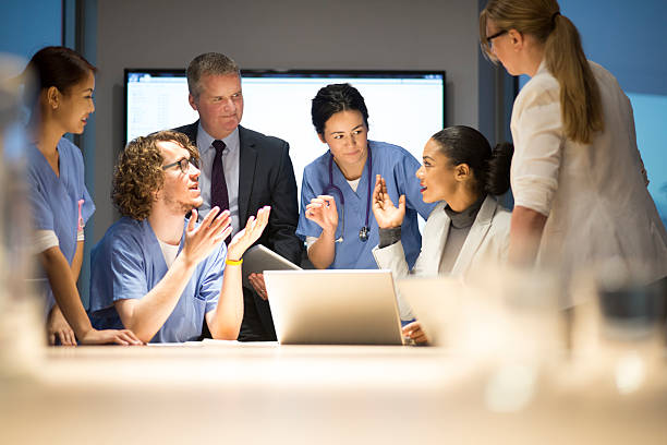 istock business and medicine working together 525755901