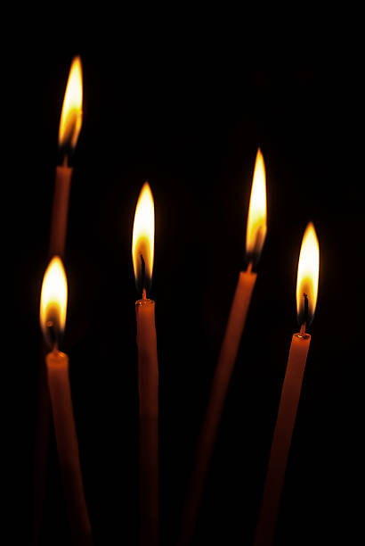 istock Burning candles in a church 525756083