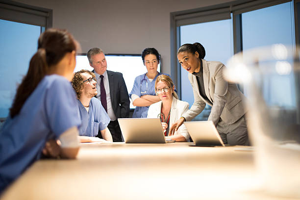 istock business and medicine working together 525756741