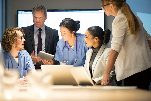istock business and medicine working together 525756765