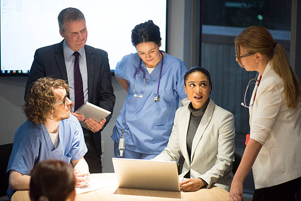 istock business and medicine working together 525756769