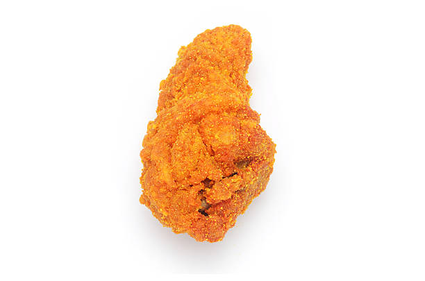 istock Golden brown fried chicken on white background 525757137