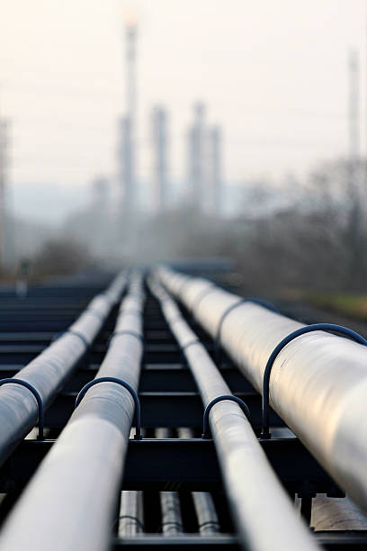 istock crude  pipeline with oil  refinery 525757151