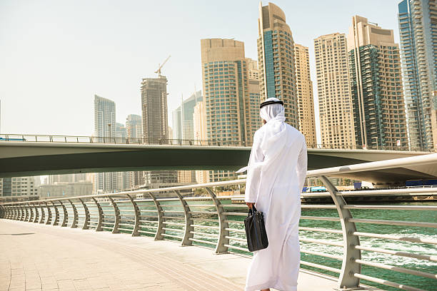 istock sheikh talking and walking togetherness on the city 525768905