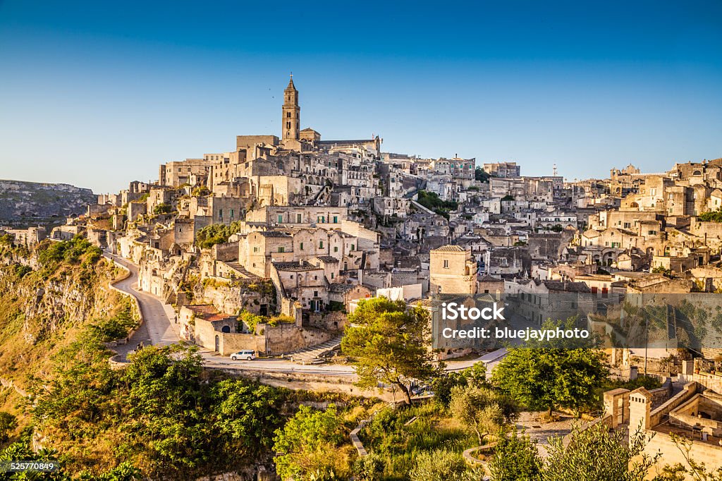 Ancient town of Matera at sunrise, Basilicata, Italy Ancient town of Matera (Sassi di Matera) at sunrise, Basilicata, southern Italy. Matera - Italy Stock Photo