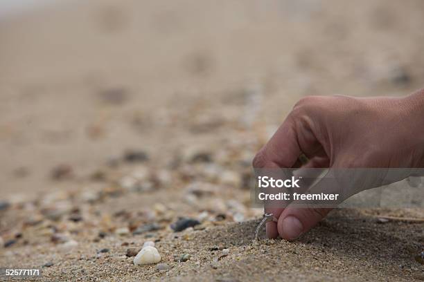 Finding Engagement Ring In The Sand Stock Photo - Download Image Now - Ring - Jewelry, Sand, Beach