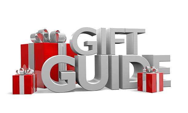 istock Gift guide text and three red Christmas gifts 525771875