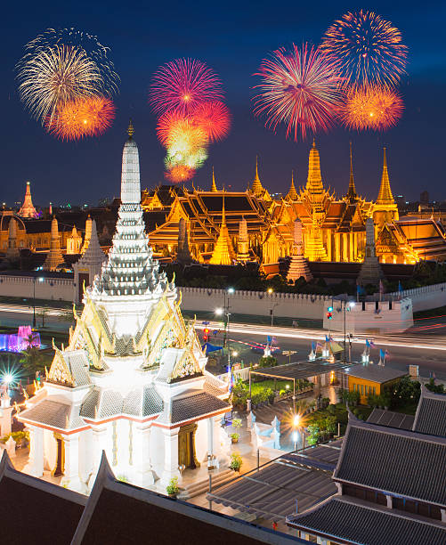 istock Firework over Temple of the Emerald Buddha at dusk 525772405