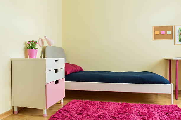 istock Cute room with pink carpet 525773143