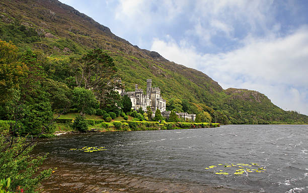 istock Kylemore Abbey in mountains on the lake. 525773835