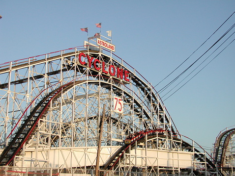 New York City, NY, USA - April 27, 2003: View of the famed wooden roller coaster, The Cylcone, on its 75th anniversary year. In Coney Island, Brooklyn.