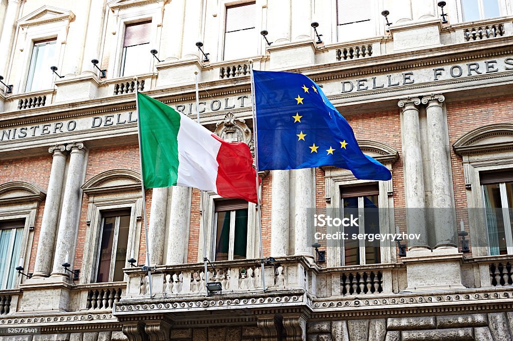 Flag of Italy and United Europe on government in Rome Flag of Italy and the United Europe on government buildings in Rome Italy Stock Photo