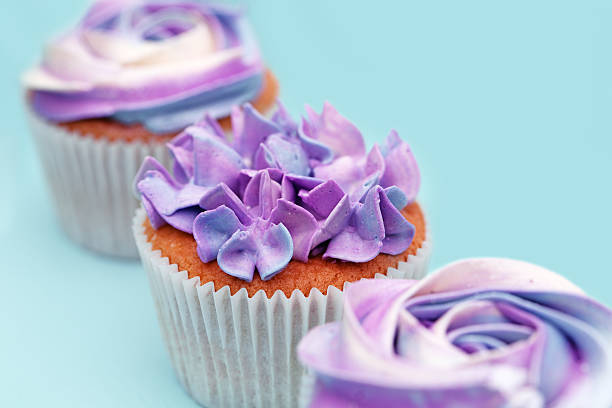 istock Sweet holiday buffet with vivid cupcakes 525786433