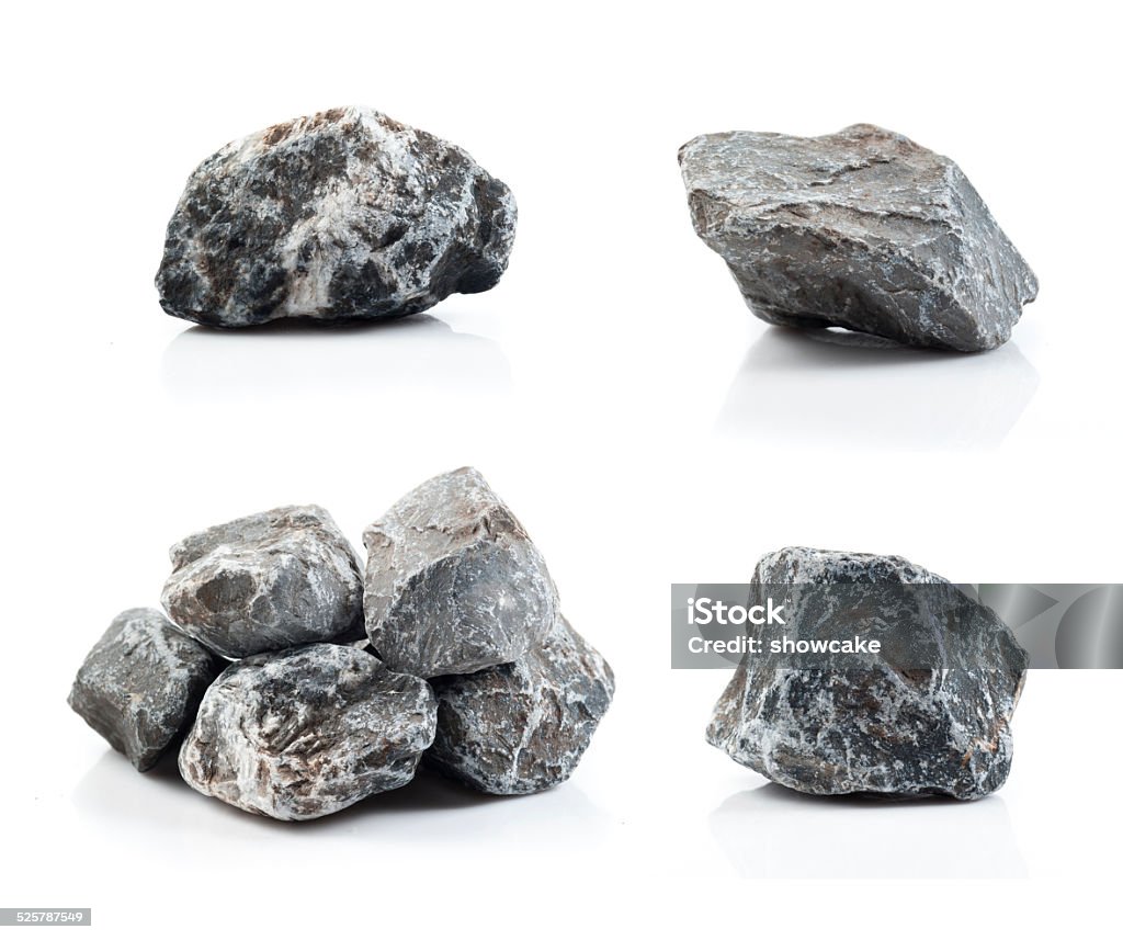 Fragment of granite Fragment of granite on a white background. Black Color Stock Photo