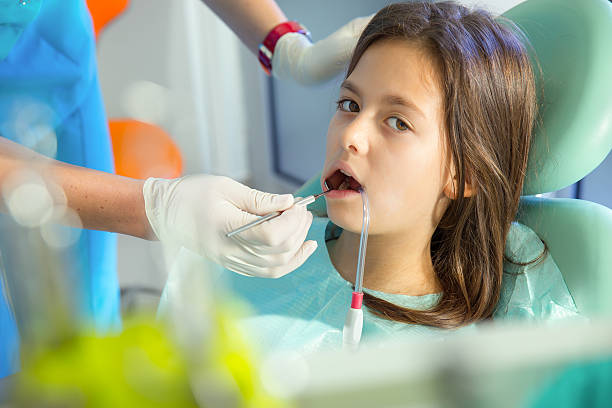 istock Child patient at the dentist 525789839
