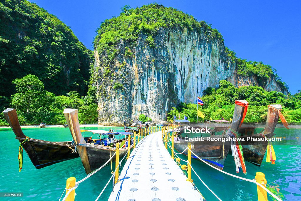 Long Tail Boat ferry at Lagoon Beach Hong island Long Tail Boat ferry at Lagoon Beach with Emerrald Seawater, Green Nature, Hong island Krabi Thailand Koh Hong Stock Photo