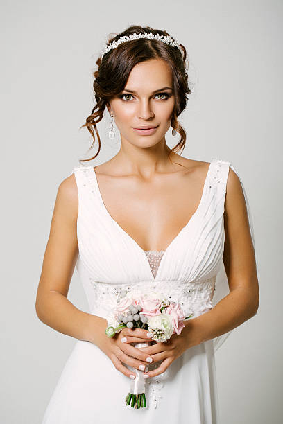 istock Studio shot of young beautiful bride 525792891