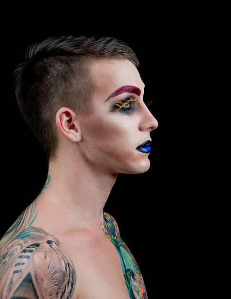 istock Handsome young man fashion model with make-up 525793155