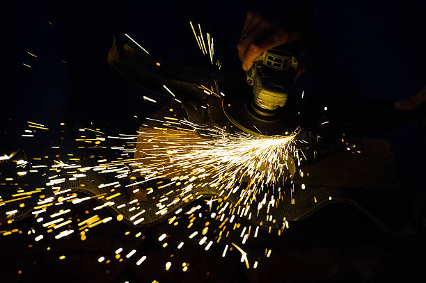 istock Metal grinding on steel pipe close up 525793261