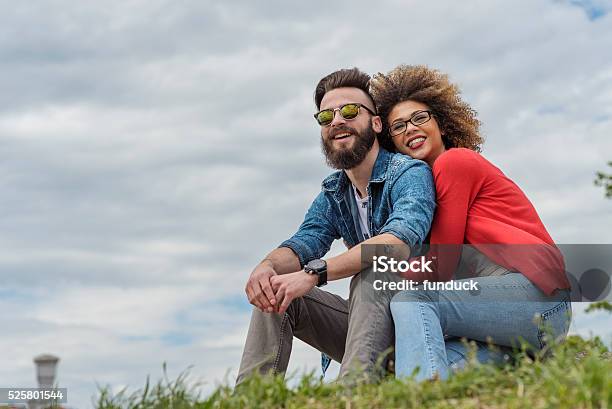 Beautiful Young Couple Smiling At The Park Stock Photo - Download Image Now - Couple - Relationship, Eyeglasses, Outdoors