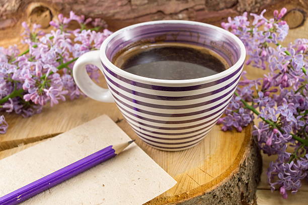 Cup of coffee and spring flowers