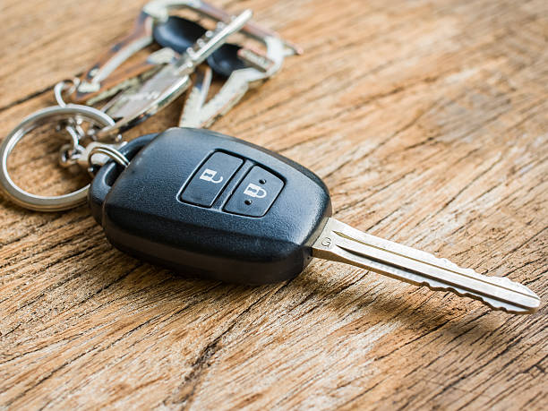 istock Car Key on wood background 525801770