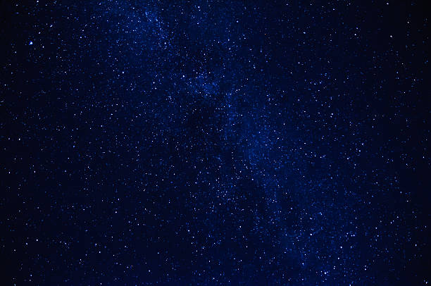 istock stars in the night sky with milky way 525802090