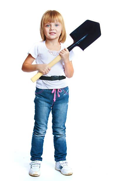 istock Little girl in blue jeans. 525802759