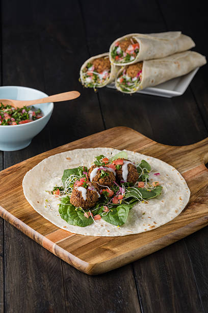 istock Vegan Falafel Wrap With Salsa 525803482