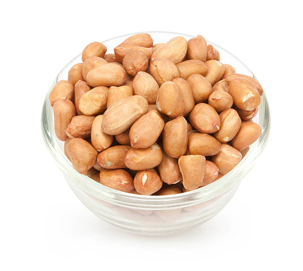 istock pinto beans on wood cup isolated 525804604