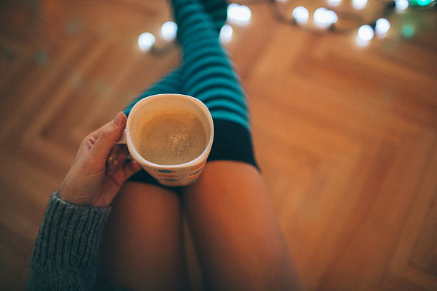 istock Girl drinking hot drink 525804899