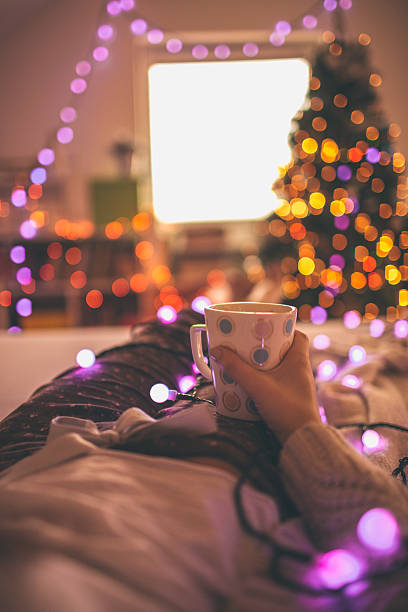 istock Girl relaxing and drinking warm drink 525804933