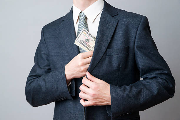 istock Businessman with money in studio 525805863