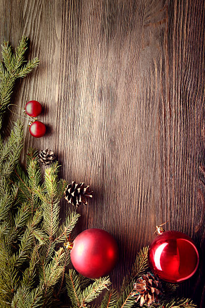 istock Christmas Tree and decorations on wooden background 525806605