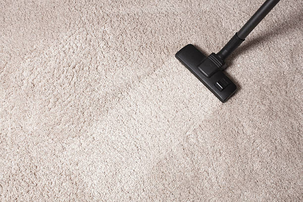istock carpet dust cleaning with vacuum cleaner 525806725
