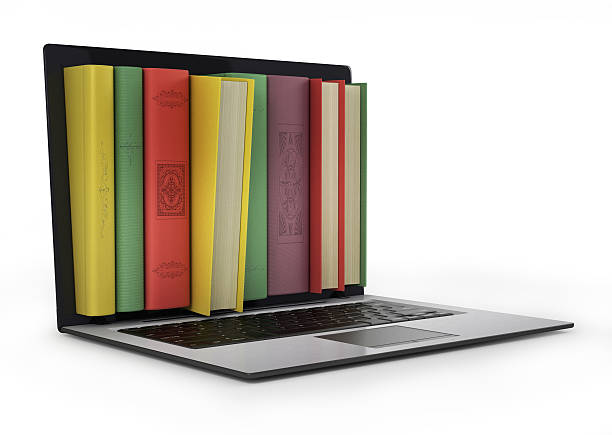istock Laptop and colorful book. education 525807005