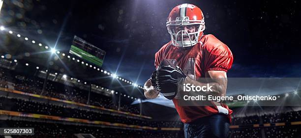 American Football Sportsman Player In Stadium Stock Photo - Download Image Now - Activity, Adult, American Football - Sport