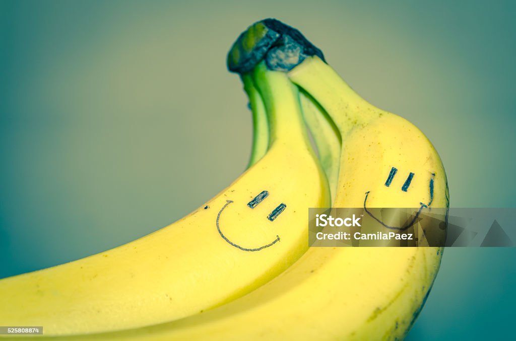 Smiled bananas Close up of two bananas with a smiley face. Banana Stock Photo