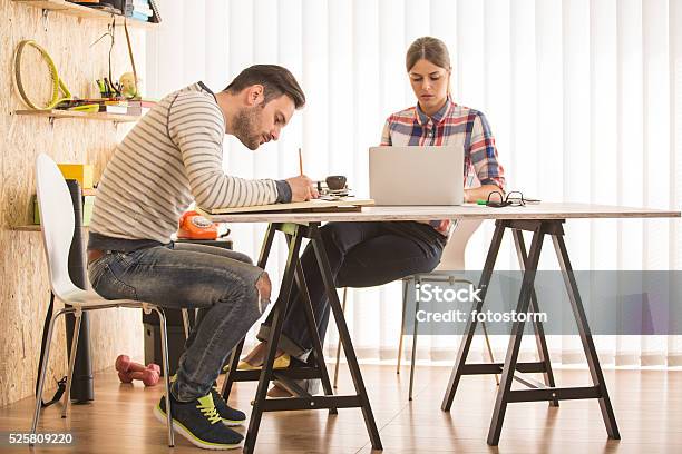 Artists Drawing Working At Modern Office Stock Photo - Download Image Now - Animator, Females, Graphic Design Studio